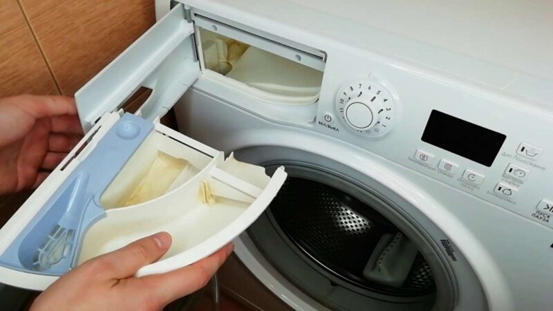 Грязный лоток для порошка